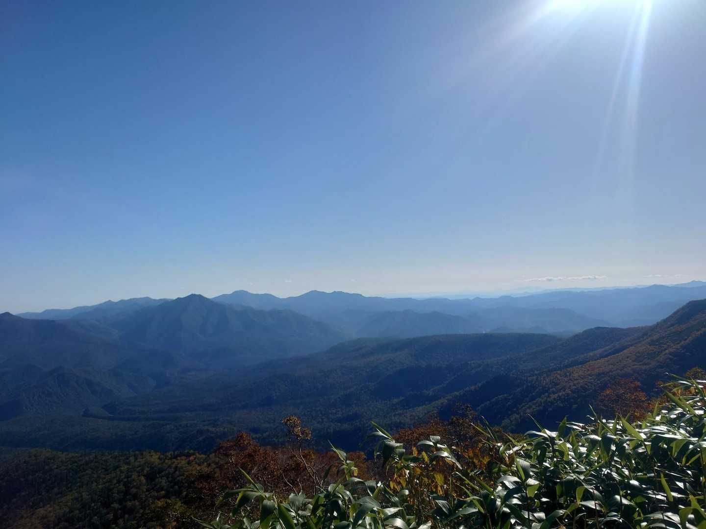 【フラット登山】巨大な山脈・大雪の壮絶な火口をぐるりと一周の写真