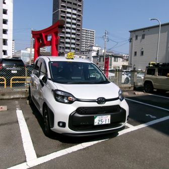 登るタクシードライバー