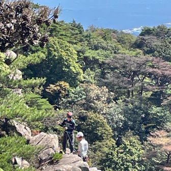 登ってる人が