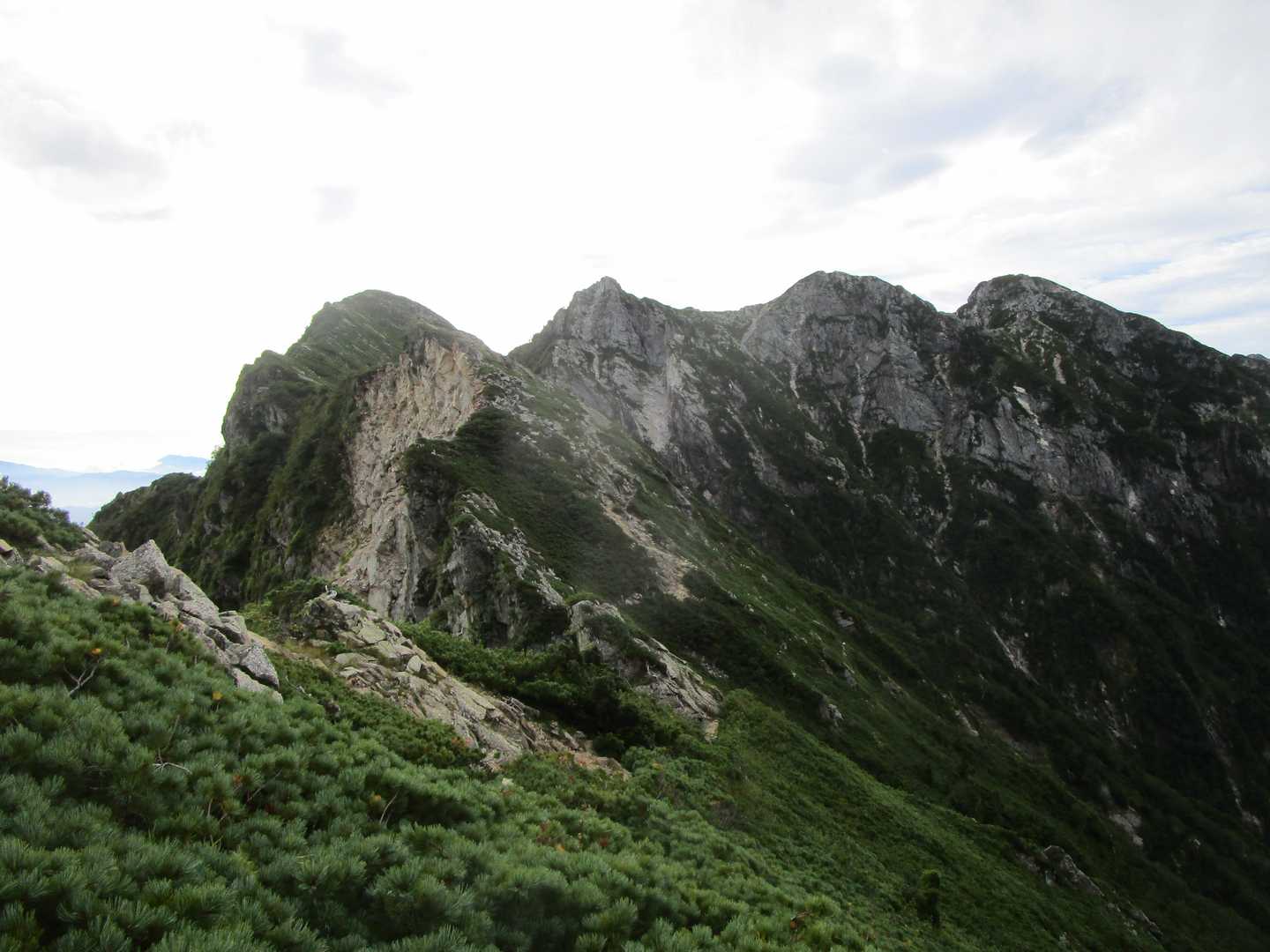 八方山-扇雪渓-丸山ケルン-唐松岳-不帰嶮-天狗の頭-猿倉 縦走コースの写真