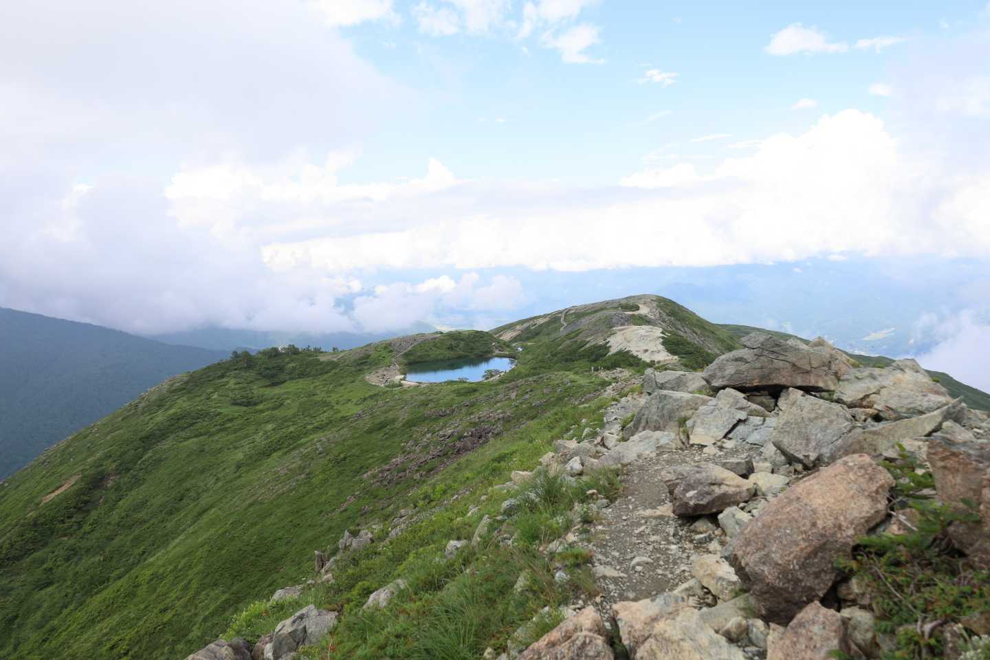 天狗の頭-不帰嶮-唐松岳-丸山ケルン-扇雪渓-八方池-八方 縦走コースの写真