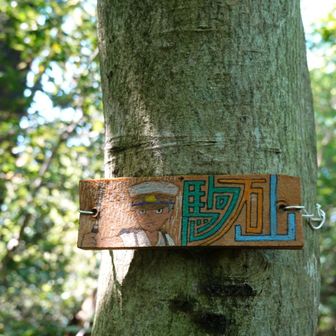 こちらはカンタ。んっ、て傘を差し出すシーンですね