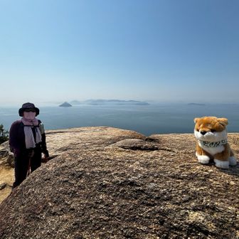 ニコニコ岩の前で撮りました🎶