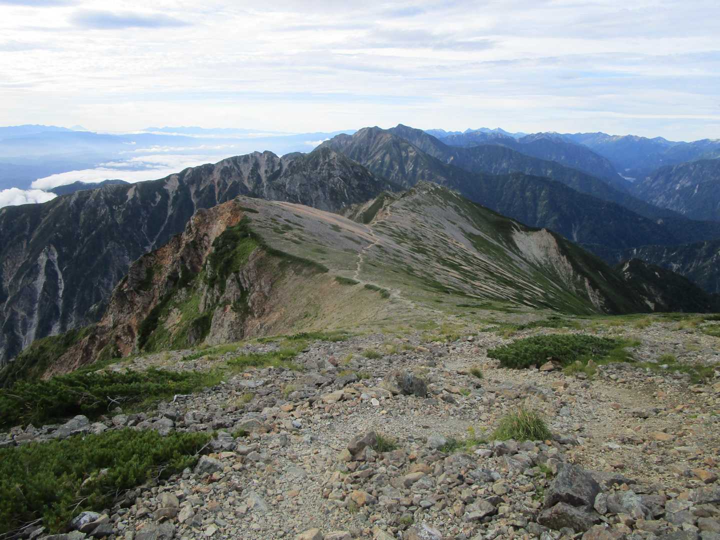 八方山-扇雪渓-丸山ケルン-唐松岳-不帰嶮-天狗の頭-猿倉 縦走コースの写真