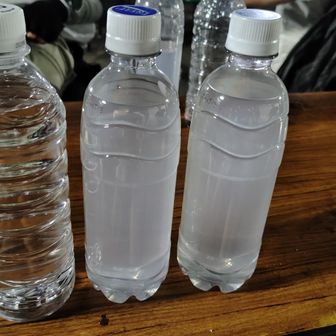 月夜見の補給。ペットボトルになってました。移し替えた後のペットボトルは回収して貰えました。