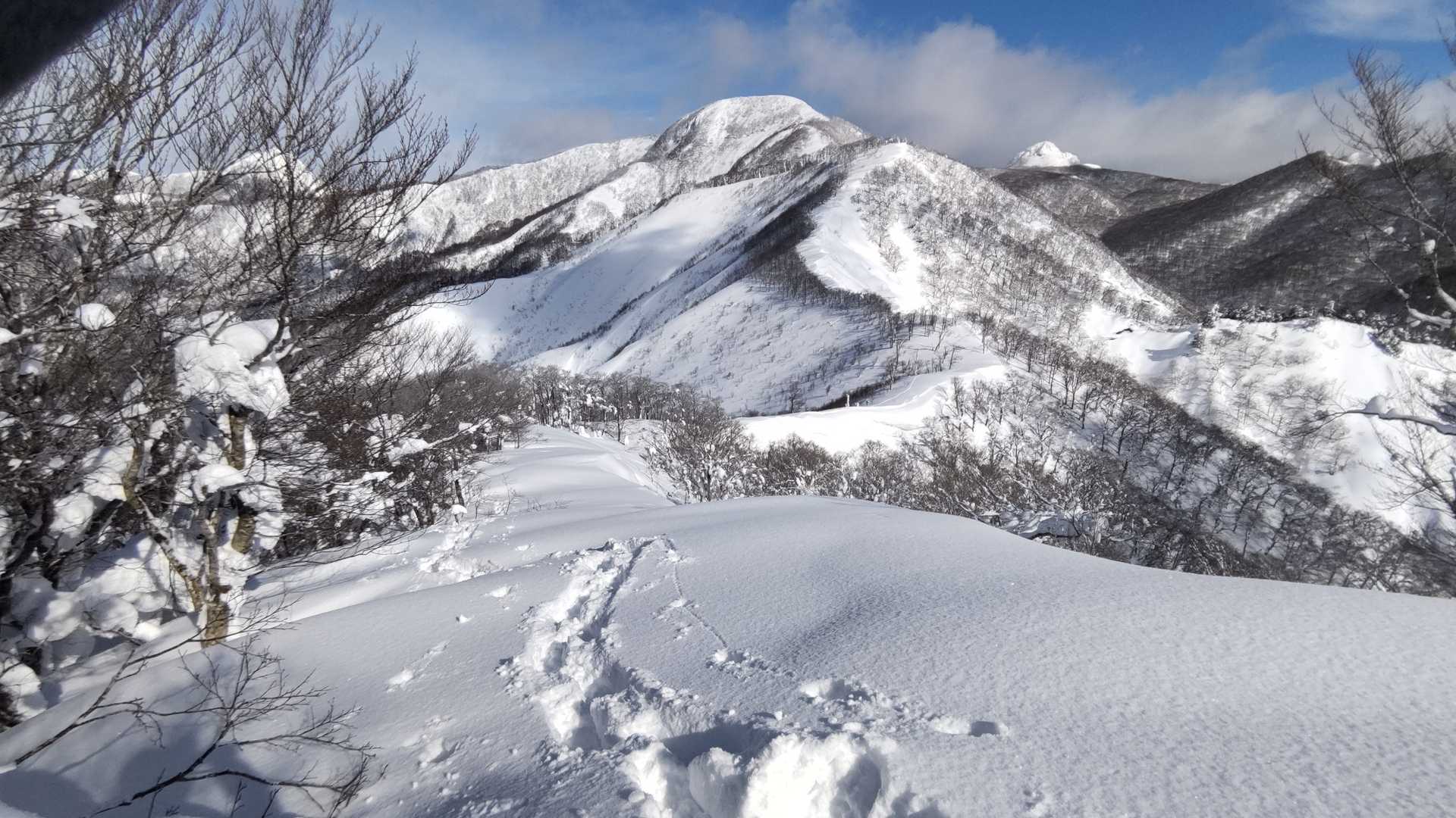 越えて来た山々